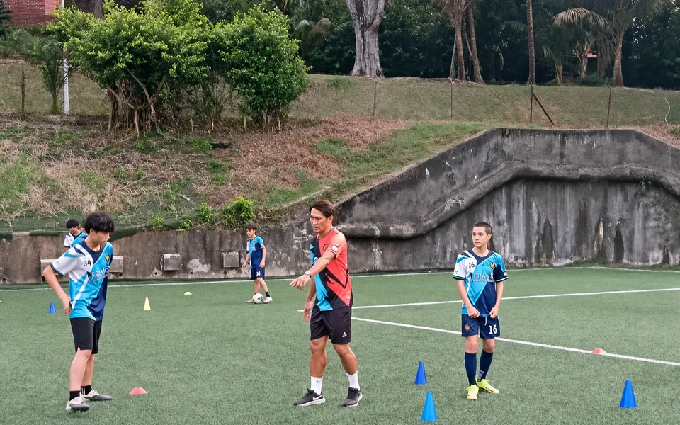 Structured football training session led by an Island City coach